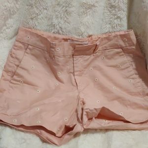 I'm selling Old Navy pink shorts with flowers on them size 4